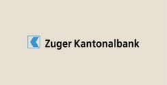 Logo der Zuger Kantonalbank mit blauem Signet und schwarzer Wortmarke auf hellem Hintergrund.